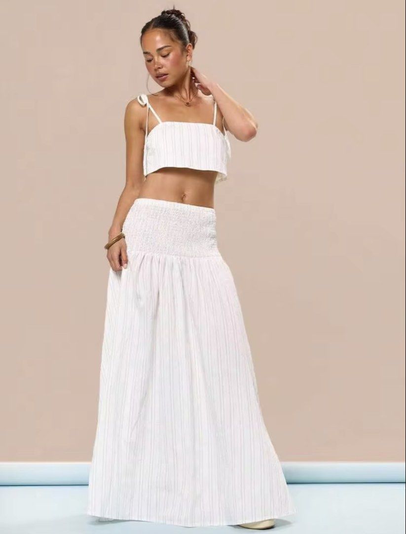 White Pinstripe Maxi Skirt ONLY (Category: Skirts) located in Villasis. Submitted by juliaxgamboa (Listing ID 1463515446, Image 2). Description: - XS to Small - Adorable white pinstripe skirt - Features a smocked-waist maxi skirt - Lightweight and flowy fabric - Ideal for beach days or summer outings - Effortless to wear and style.