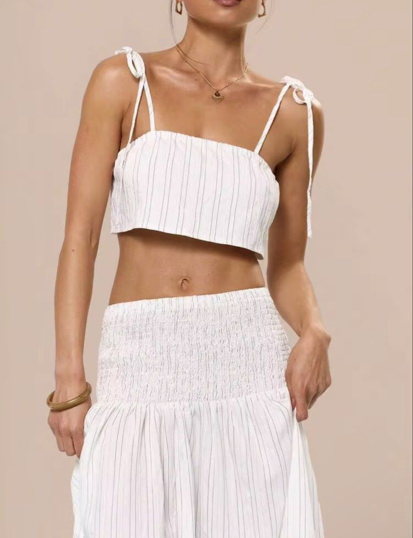 White Pinstripe Maxi Skirt ONLY (Category: Skirts) located in Villasis. Submitted by juliaxgamboa (Listing ID 1463515446, Image 3). Description: - XS to Small - Adorable white pinstripe skirt - Features a smocked-waist maxi skirt - Lightweight and flowy fabric - Ideal for beach days or summer outings - Effortless to wear and style.