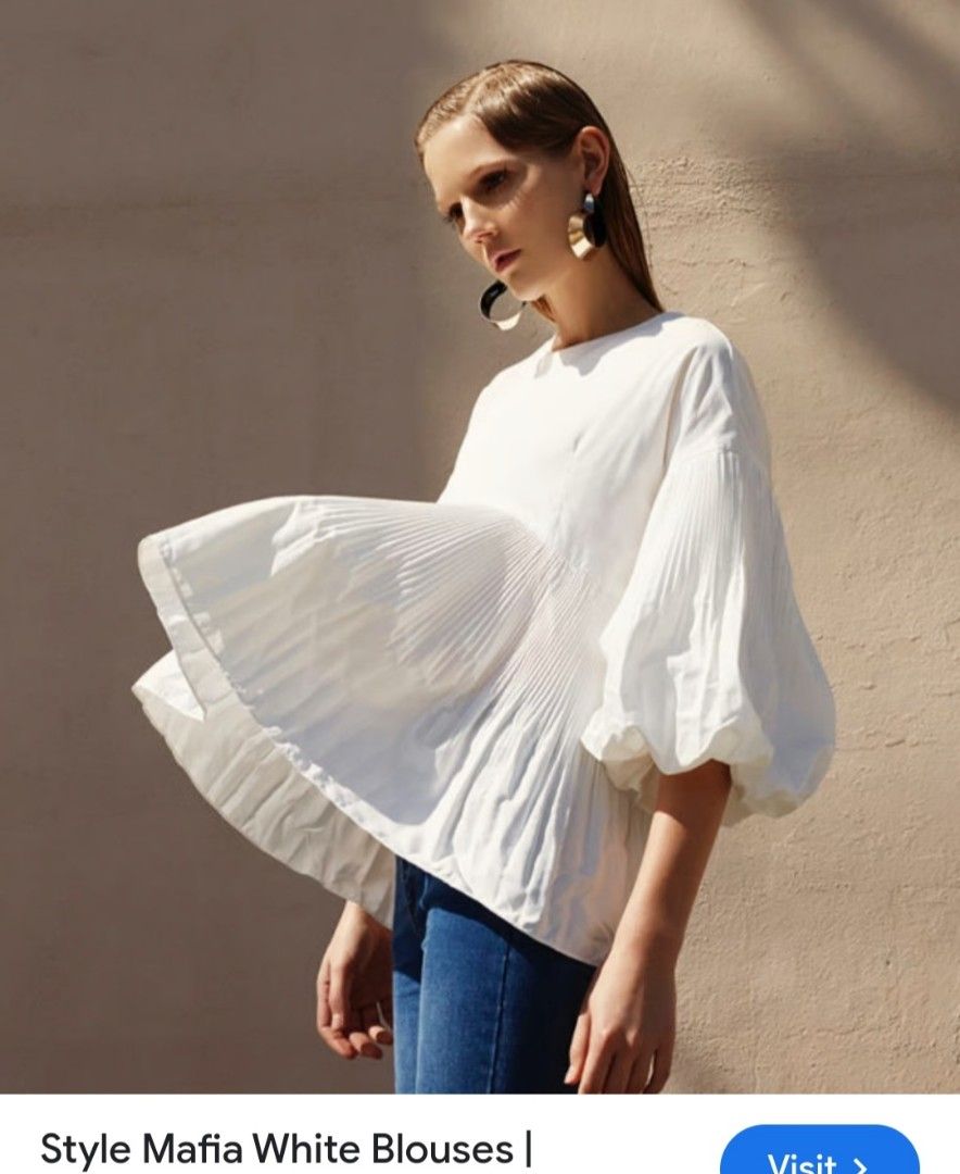 White Pleated Balloon Sleeve Top (Category: Blouses) located in Manila. Submitted by PrinceDani.Clothing (Listing ID 1463399581, Image 1). Description: white pleated balloon sleeves top large fit 21in width 26in length excellent condition .