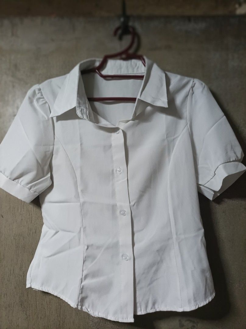 WHITE POLO BLOUSE (Category: Blouses) located in Makati City. Submitted by jessu_ (Listing ID 1463383546, Image 1). Description: White blouse. Collared, button-down with slight puff sleeves. Perfect for work or casual outfits. Small to medium 2nd photo for closer look Buy 3 + 1 free of your choice from any available listing RFS: Decluttering MOP: GCash or bank transfer.