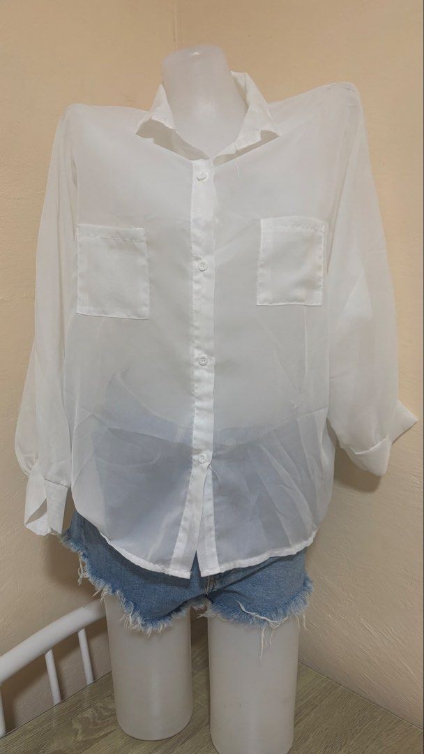 White Sheer Button-Up Shirt with Pockets (Category: Shirts) located in Santa Cruz. Submitted by homedecluttersale (Listing ID 1463521541, Image 1). Description: • Unused • Fits small to medium • In excellent condition • Photos taken using mannequin only 🚚 Shipping via J&T only 📦 Shipping fee to be shouldered by buyer 💳 Mode of payment: GCash 📍 Santa Cruz, Laguna.