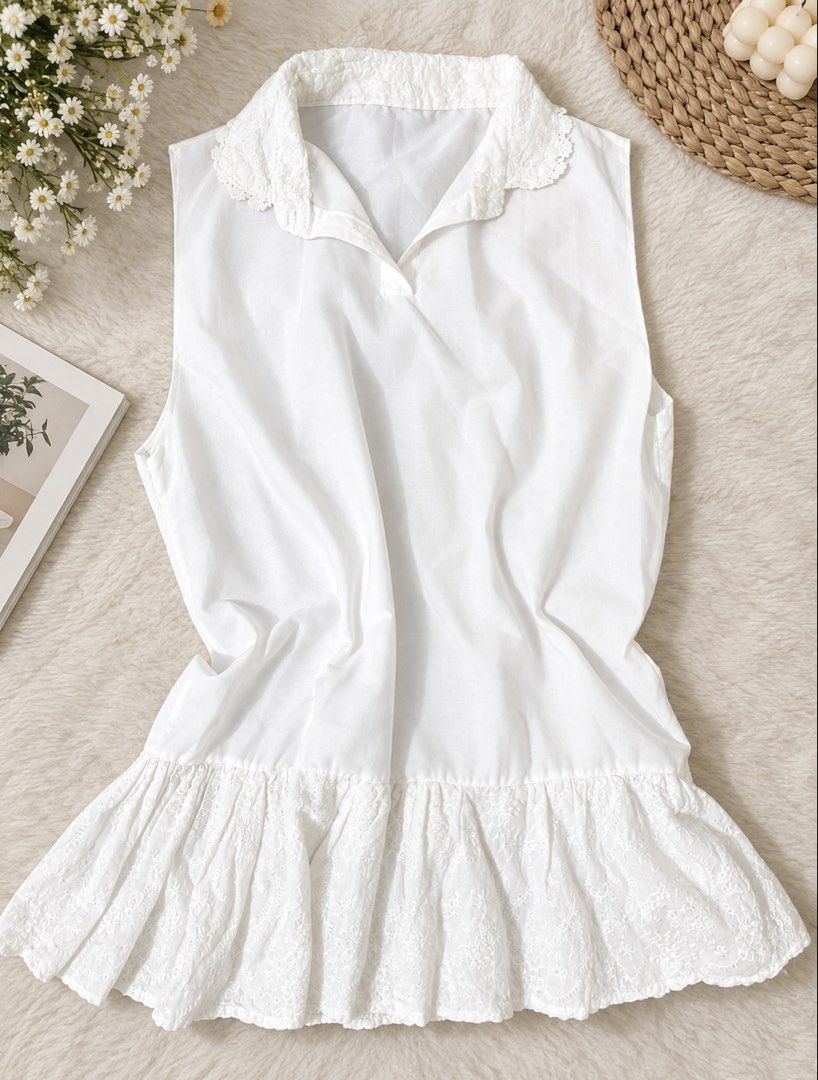 White Sleeveless Collared Top with Lace Trim (Category: Sleeveless) located in Mabalacat. Submitted by mavcab8 (Listing ID 1463388848, Image 1). Description: - Cute white sleeveless doll top - Collared neckline with delicate lace trim - Ruffled lace detail at the hem - Versatile for casual or dressed-up outfits - Pairs well with skirts and shorts.