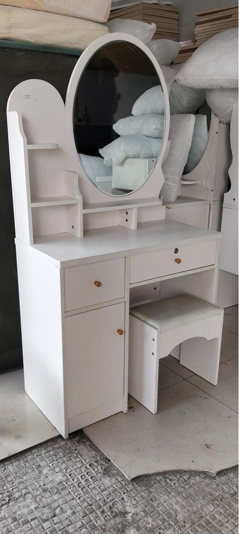 White Vanity Dressing Table with Mirror and Stool (Category: Shelves, Cabinets & Racks) located in Manila. Submitted by miriamnicd51467 (Listing ID 1463361169, Image 1). Description: Available 30pcs‼️‼️ Wooden Vanity with chairs 3,500 fix‼️ No Issue/ Hidden Issue PM IF INTERESTED‼️ loc: Paranaque.
