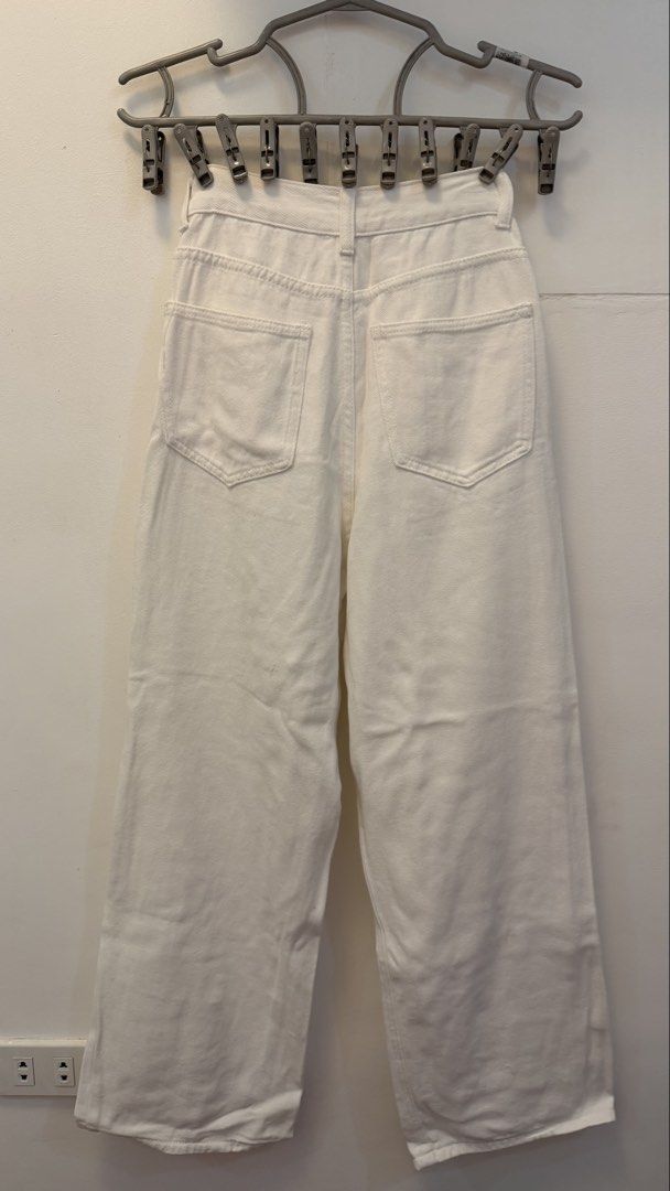 White Wide Leg Jeans (Category: Jeans) located in Angeles City. Submitted by hooni_park (Listing ID 1463481690, Image 2). Description: - Trendy white wide-leg jeans - Flattering high-waisted fit - Classic five-pocket design - Secure button and zip closure - Relaxed, comfortable fit - Ideal for casual outfits.