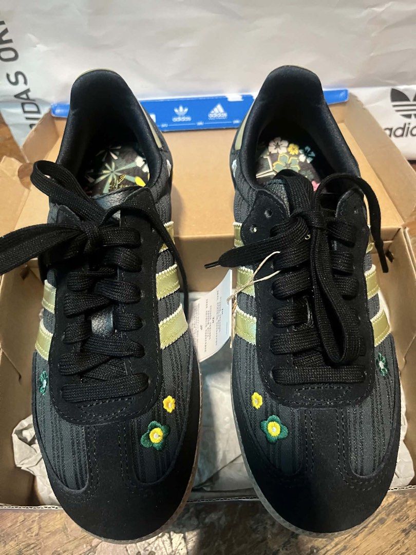 Womens Adidas Samba Shoes (Category: Sneakers) located in Pasig City. Submitted by dawgshow (Listing ID 1463459141, Image 3). Description: - Adidas Samba Shoes - Color: Black with Gold Stripes - Unique Feature: Cute floral embroidery on front and heel - Condition: Brand new, comes with original box and tags - Origin: Made in Vietnam - Size: 5.5 UK / 4 US / 225 JPN - Original Retail Price: PHP 6,800.00.