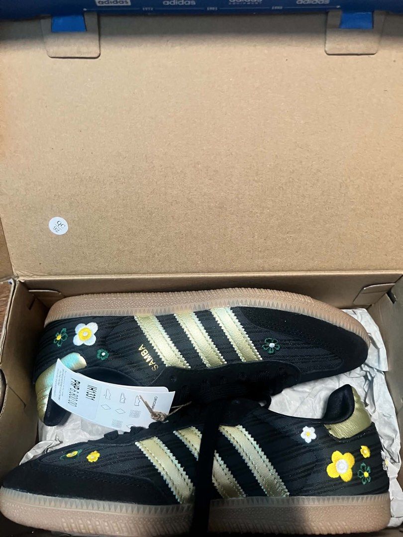Womens Adidas Samba Shoes (Category: Sneakers) located in Pasig City. Submitted by dawgshow (Listing ID 1463459141, Image 2). Description: - Adidas Samba Shoes - Color: Black with Gold Stripes - Unique Feature: Cute floral embroidery on front and heel - Condition: Brand new, comes with original box and tags - Origin: Made in Vietnam - Size: 5.5 UK / 4 US / 225 JPN - Original Retail Price: PHP 6,800.00.