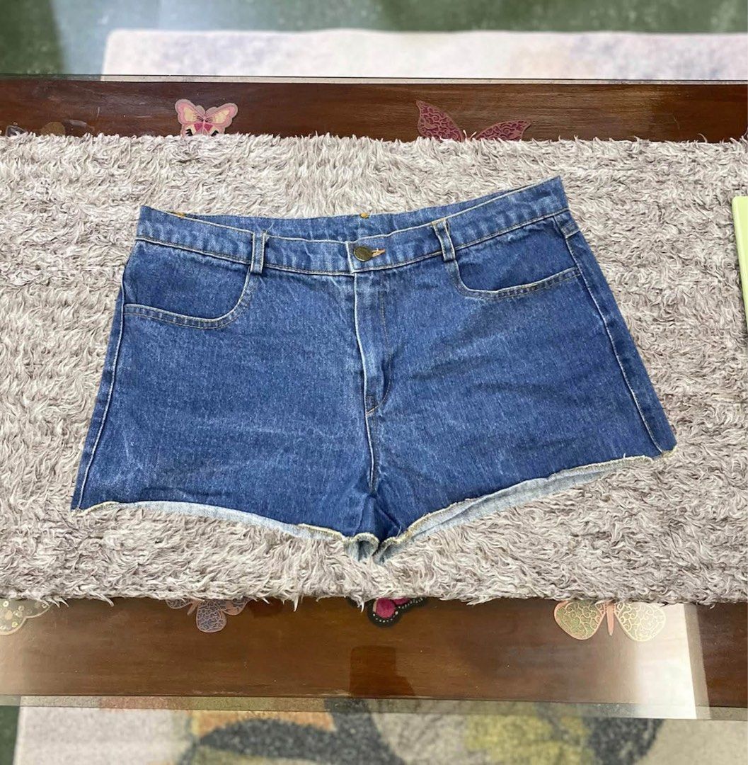 Women's Denim Shorts - Various Washes (Category: Shorts) located in Manila. Submitted by cherrytwaffle (Listing ID 1463327151, Image 2). Description: - Cute denim shorts perfect for summer - Available colors: White, Classic Blue, Light Blue Wash - Features a stylish rolled hem detail - Classic five-pocket styling for practicality - Secure button and zip closure - Ideal for casual outings, beach days, and everyday wear - Effortlessly pairs with an