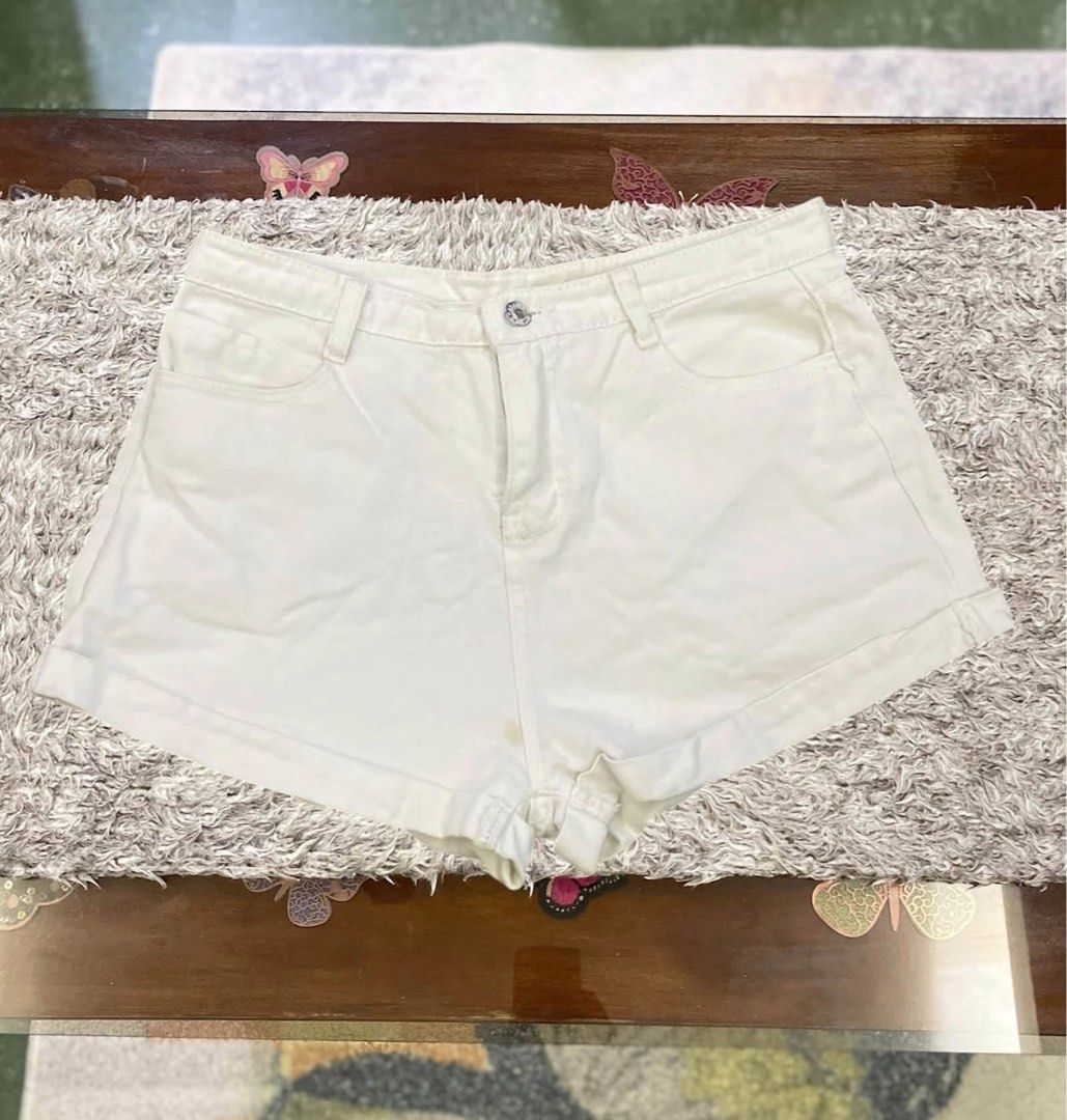 Women's Denim Shorts - Various Washes (Category: Shorts) located in Manila. Submitted by cherrytwaffle (Listing ID 1463327151, Image 1). Description: - Cute denim shorts perfect for summer - Available colors: White, Classic Blue, Light Blue Wash - Features a stylish rolled hem detail - Classic five-pocket styling for practicality - Secure button and zip closure - Ideal for casual outings, beach days, and everyday wear - Effortlessly pairs with an