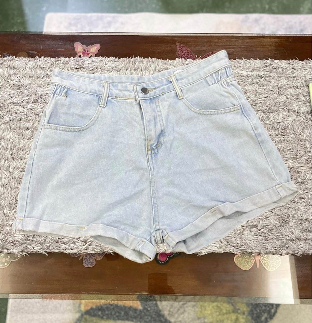 Women's Denim Shorts - Various Washes (Category: Shorts) located in Manila. Submitted by cherrytwaffle (Listing ID 1463327151, Image 3). Description: - Cute denim shorts perfect for summer - Available colors: White, Classic Blue, Light Blue Wash - Features a stylish rolled hem detail - Classic five-pocket styling for practicality - Secure button and zip closure - Ideal for casual outings, beach days, and everyday wear - Effortlessly pairs with an