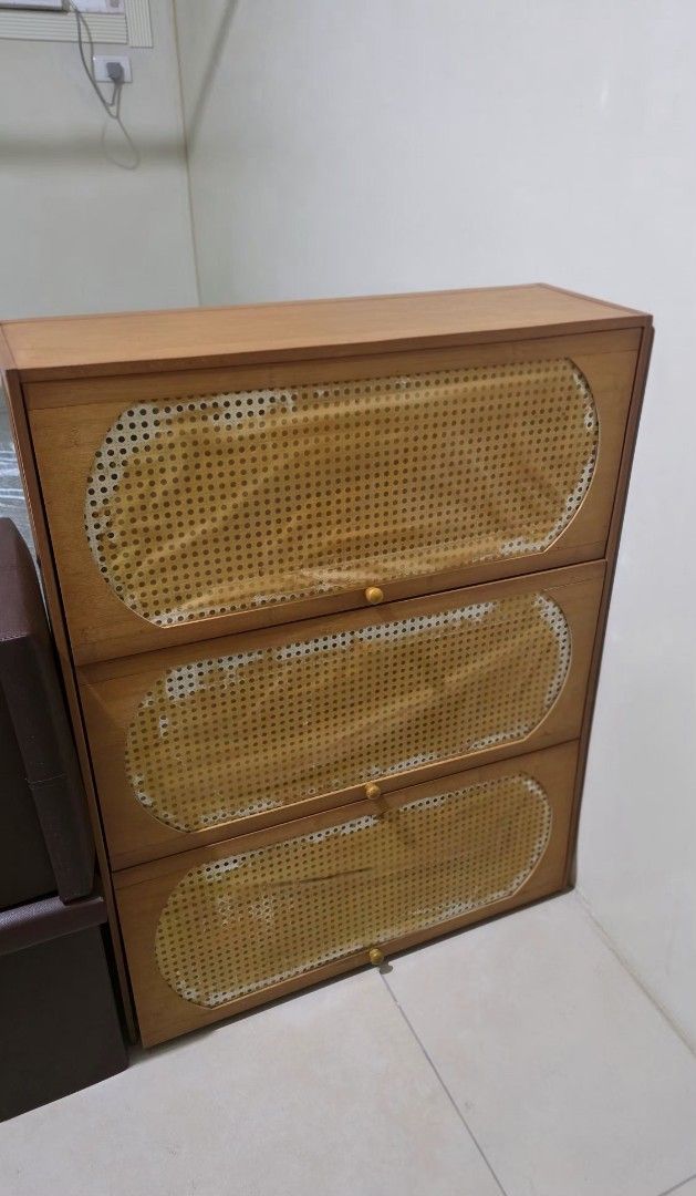 Wooden Cabinet with Rattan Doors (Category: Shelves, Cabinets & Racks) located in Mandaluyong City. Submitted by square.rooth (Listing ID 1463364483, Image 1). Description: 3 layers Good as new No issues RFS: upgrade.