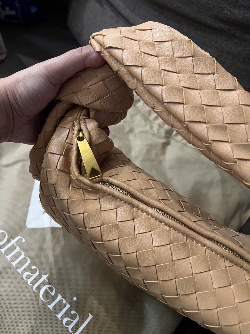 Woven bag (Category: Shoulder Bags) located in Paranaque City. Submitted by elle21fabfinds (Listing ID 1463431440, Image 2). Description: Queen of Material woven bag. Bought in Bangkok, Thailand. Color: Caramel.