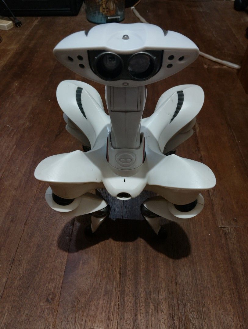 WowWee Robosapien X Robot Toy (Category: Remote Control Toys) located in Manila. Submitted by boyhet.thrift15 (Listing ID 1463513262, Image 1). Description: - White robot toy - Features two eyes and four legs - Power button located on the front - Lights up red when turned on - Perfect for kids or collectors - Minor scuffs from storage,spring batt. DYI para mg work ulet.no remote slight scratch sa robot .but tested and working condition - selling 