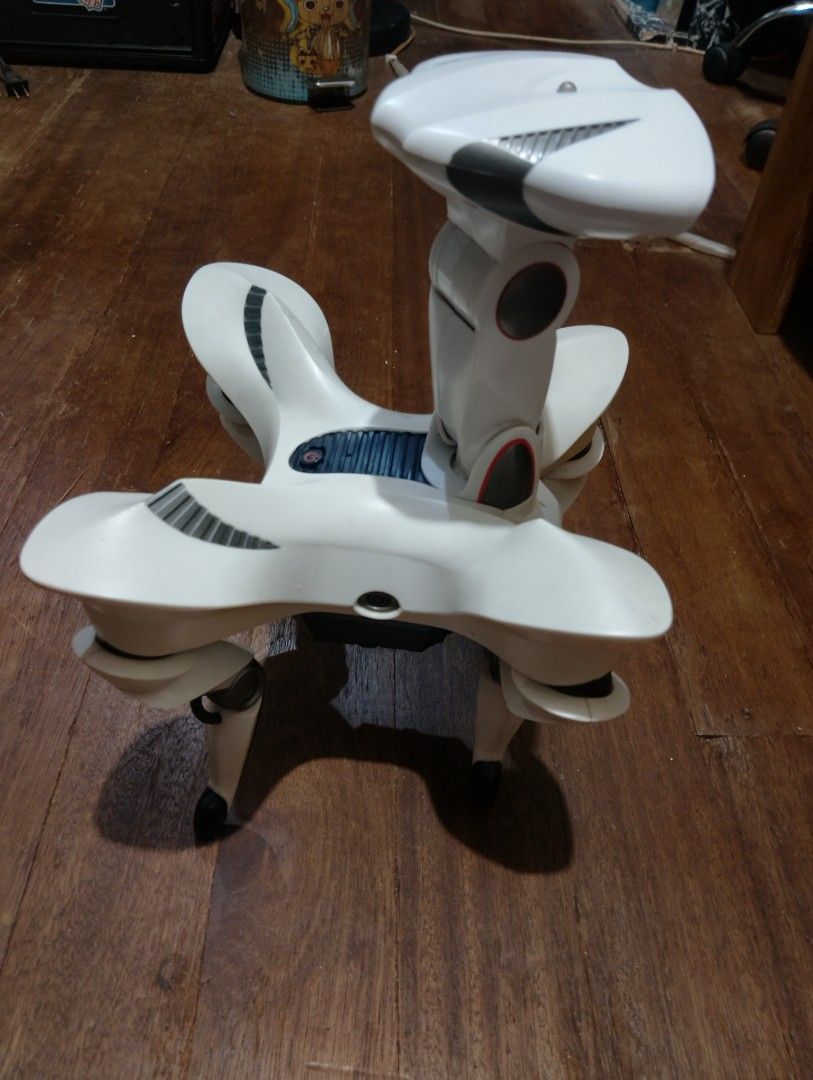 WowWee Robosapien X Robot Toy (Category: Remote Control Toys) located in Manila. Submitted by boyhet.thrift15 (Listing ID 1463513262, Image 2). Description: - White robot toy - Features two eyes and four legs - Power button located on the front - Lights up red when turned on - Perfect for kids or collectors - Minor scuffs from storage,spring batt. DYI para mg work ulet.no remote slight scratch sa robot .but tested and working condition - selling 