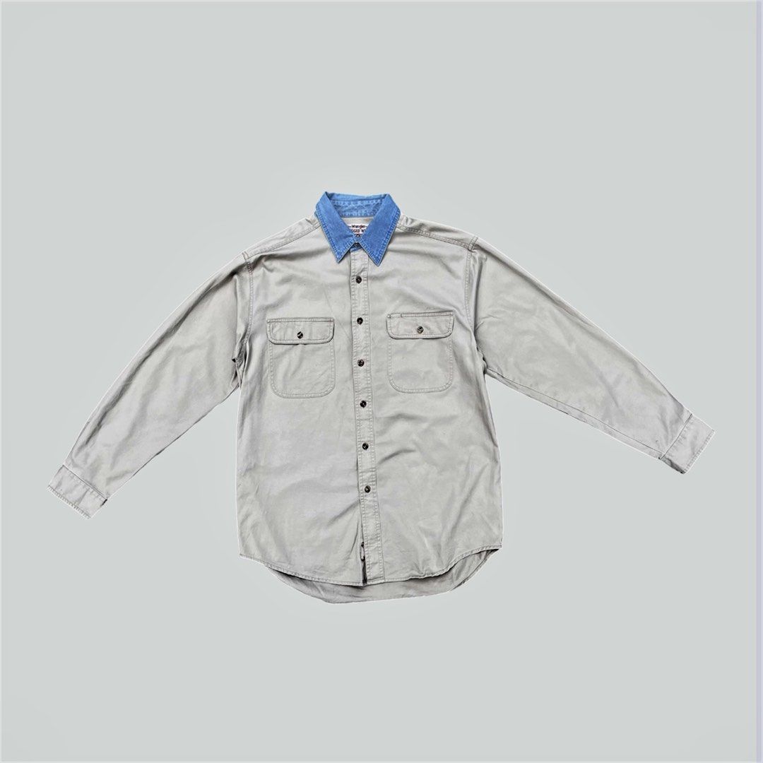 Wrangler Workwear (Category: Tshirts & Polo Shirts ) located in Calamba. Submitted by juan_jawnz (Listing ID 1463395305, Image 1). Description: Wrangler contrast collar Patch Shirt PHP 880 Length - 30.5 F, 32.5 B Inches Width - 23 Inches Shoulder - 20 Inches Sleeve - 25.5 Inches Off-white / light stone canvas with light-wash denim contrast collar + oval elbow patches. Dual flap chest pockets, long sleeves with button cuffs. Back box pleat. Workwe