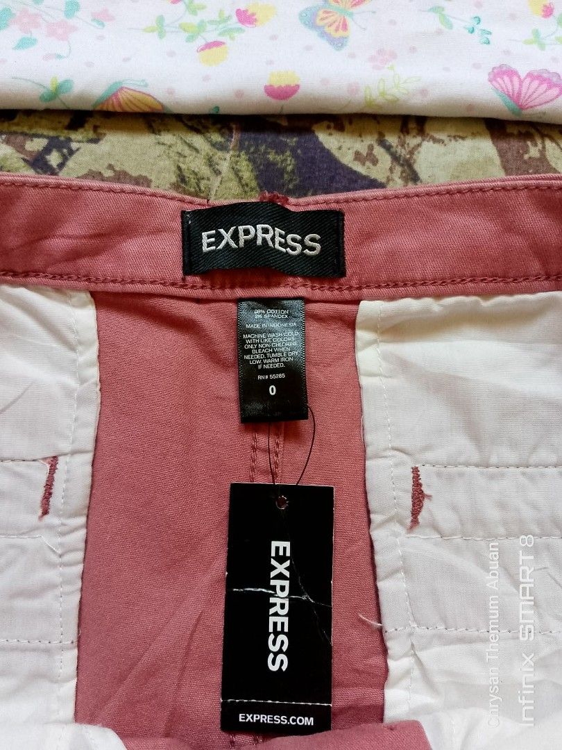 Y2k Express Micro Shorts (Category: Shorts) located in Santa Cruz. Submitted by chrysan_025 (Listing ID 1463366093, Image 2). Description: size 0 on tag size 32" via tape measure.