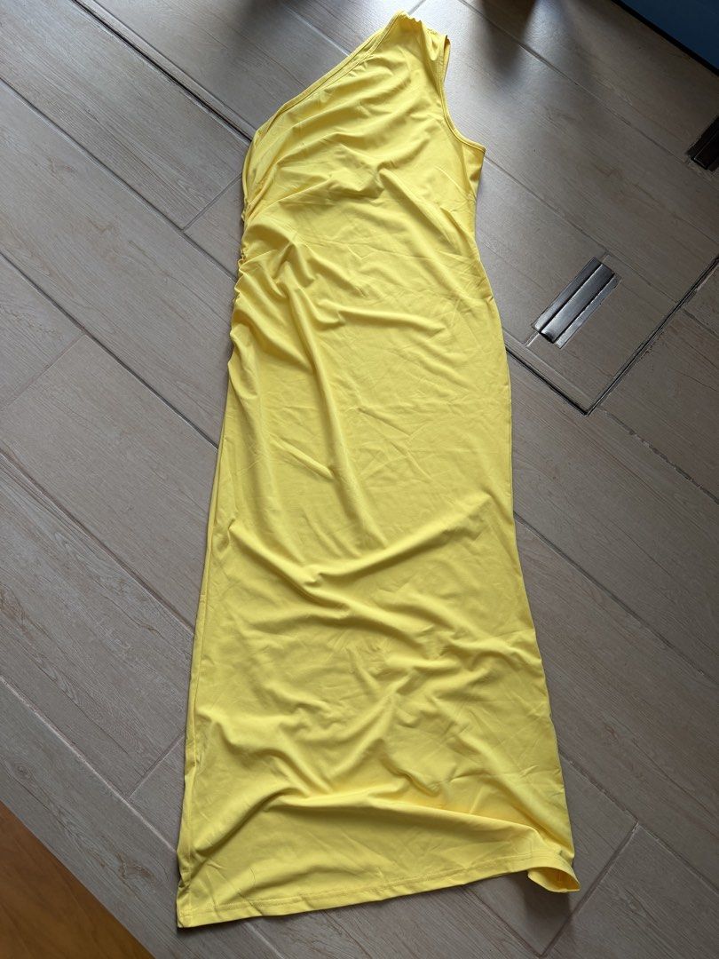 Yellow One-Shoulder Ruched Maxi Dress (Category: Dresses) located in Makati City. Submitted by ariannelaz54133 (Listing ID 1463553766, Image 1). Description: - Flowy yellow maxi dress - One-shoulder design - Side ruching detail - Ideal for parties or a night out - Comfortable and stylish fit.