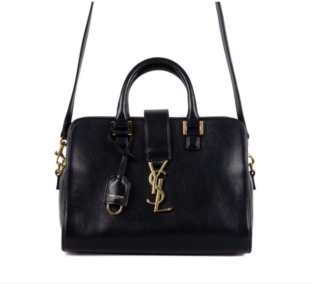YSL Baby Cabas Black Monogram Bag (Category: Luxury Bags & Wallets) located in Taguig. Submitted by luxeinofficial (Listing ID 1463351935, Image 3). Description: YSL Baby Cabas Black Monogram Bag SKU: EVQEF9 Gender: Ladies Material: Calfskin leather Stamp: FLY568853Y032 Interior: One open pocket and one main compartment Measurements: 10.1”L X 5”W X 7.5”H Handle Drop: 3” Hardware: Gold tone Inclusions: Removable strap Detailed Item Description: Th