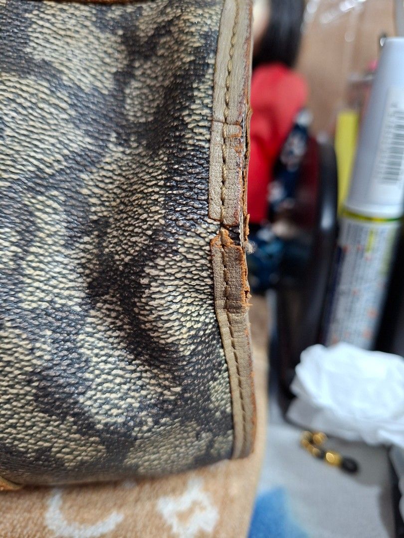 Yves Saint Laurent YSL Monogram Boston Bag (Category: Luxury Bags & Wallets) located in Lucena. Submitted by dai_suki (Listing ID 1463475608, Image 2). Description: - Authentic vintage YSL monogram boston bag - Classic YSL monogram pattern - Genuine leather trim and handles - Secure zipper closure - Ideal for everyday use or travel - Features authentic YSL hardware.