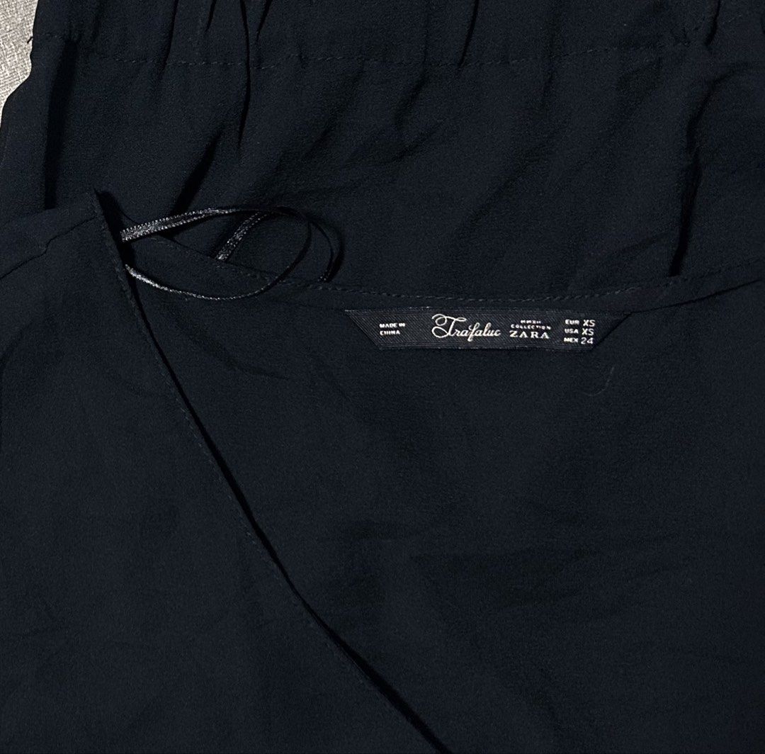 ZARA (Category: Dresses) located in Davao. Submitted by sart0ria85 (Listing ID 1463389150, Image 3). Description: A black LBD in sleeves with embellishments on abdomen. 100% POLYESTER MADE IN CHINA 🇨🇳 XSMALL. Size 2 EXCELLENT CONDITION (94/100).