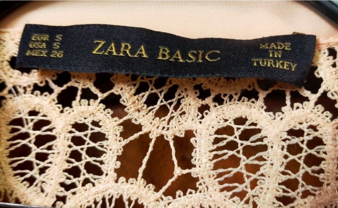 Zara Basic Lace Shirt Top (Category: Shirts) located in Mabalacat. Submitted by lysmnl6 (Listing ID 1463334530, Image 3). Description: - Zara Basic peach lace shirt - Size S - Short sleeves - Collared neckline - Button-up front - Intricate and beautiful lace pattern - Made in Turkey.