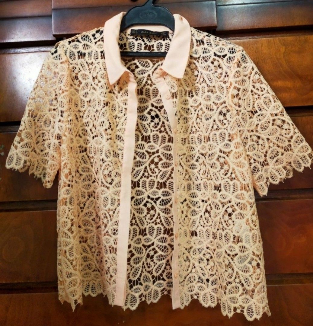 Zara Basic Lace Shirt Top (Category: Shirts) located in Mabalacat. Submitted by lysmnl6 (Listing ID 1463334530, Image 1). Description: - Zara Basic peach lace shirt - Size S - Short sleeves - Collared neckline - Button-up front - Intricate and beautiful lace pattern - Made in Turkey.