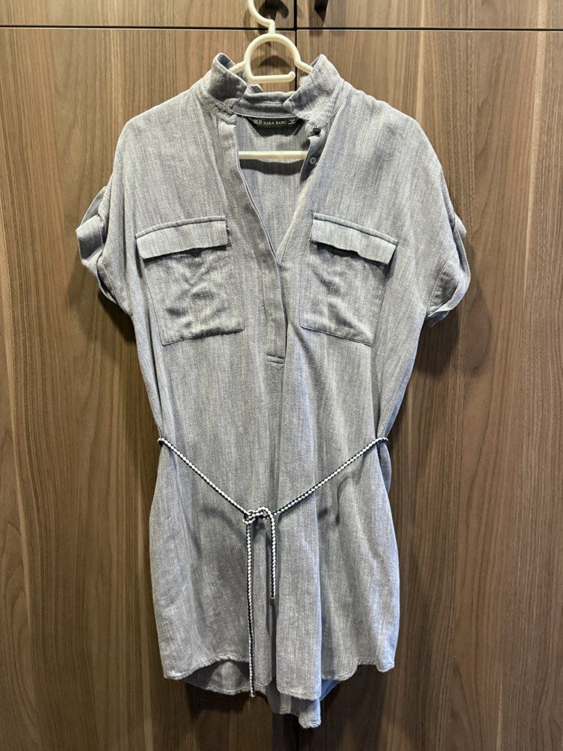 Zara Basic Shirt Dress with Belt (Category: Dresses) located in Marikina City. Submitted by samndbx (Listing ID 1463351747, Image 1). Description: - Size XS but can fit up to M: WIDTH: 47cm | LENGTH: 80cm - Short sleeves with roll-up detail - Two chest pockets - Button-up front - Comes with a matching rope belt - Made in Morocco I’m 169cm and it’s an above the knee dress for me. .