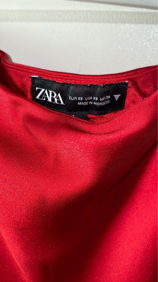 Zara Red Satin Maxi Skirt (Category: Skirts) located in Caloocan City. Submitted by favestop (Listing ID 1463464086, Image 2). Description: - Zara Red Satin Maxi Skirt - Size: XS - Made in Morocco - Versatile: Dress up or down.