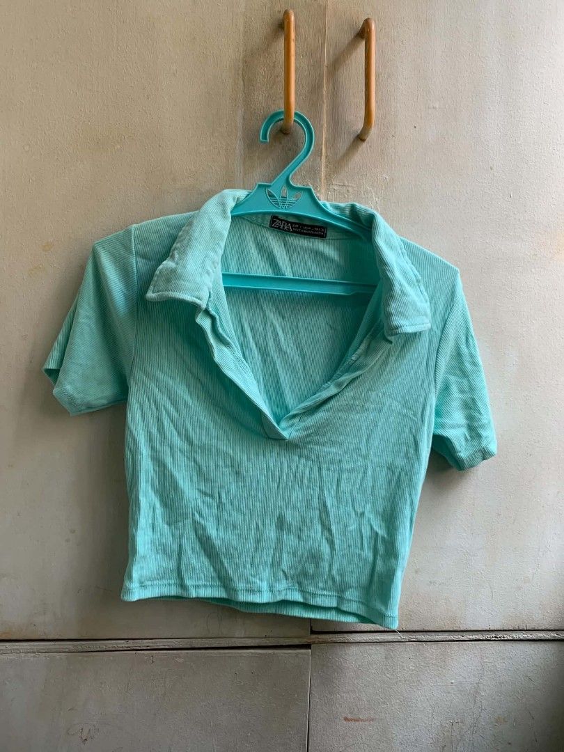 Zara Ribbed Cropped Polo Shirt Mint Green (Category: Shirts) located in Manila. Submitted by usagichan_rabbit (Listing ID 1463342821, Image 1). Description: - Zara mint green cropped polo shirt - Ribbed texture all over - Short sleeves - Collared neckline with V-cut - Super cute and comfy - Perfect for casual wear or dressing up small.
