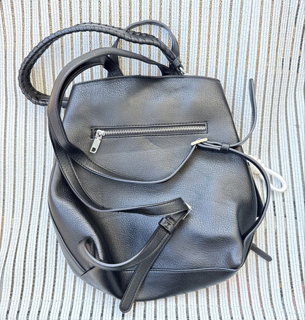 -10.31- USED DESIGUAL Multi-Position Backpack (Category: Backpacks) located in Cebu City. Submitted by nihonfindsbyhimawari26 (Listing ID 1463606514, Image 3). Description: 🚨 NOT YET AVAILABLE FOR PURCHASE ✈️ On the way from Japan 📦 ETA: End of Oct ⸻ 🖤✨ DESIGUAL MULTI-POSITION BACKPACK ✨🖤 Brand: DESIGUAL Style: Convertible Backpack / Handbag / Shoulder Bag Color: Black Material: Grained faux leather Made in: China 🇨🇳 Purchased in: Japan 🇯�