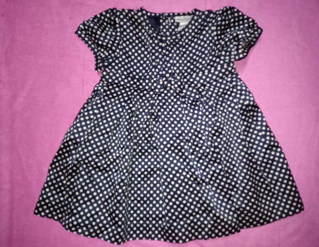 12-18months Polka Dot Dress (Category: Babies & Kids Fashion) located in Quezon City. Submitted by sheyn.anya (Listing ID 1463689471, Image 1). Description: - Adorable navy blue dress with classic white polka dots. - Features cute short puff sleeves. - Comfortable gathered waist for a flattering fit. - Ideal for parties, playdates, or everyday casual outings. - Easy to wear and super comfortable for your little one..