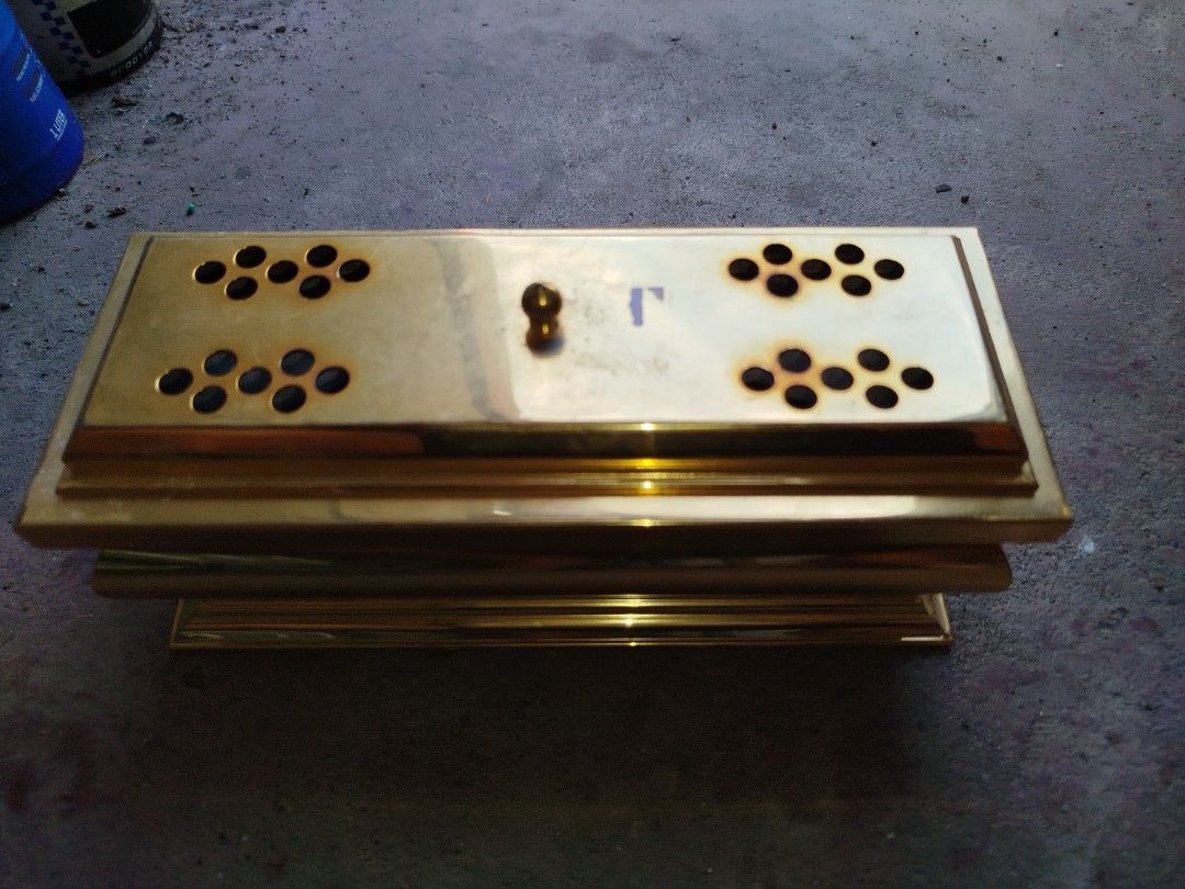 12" 24K Gold Plated Incense Burner with Cover (Category: Home Fragrance) located in Manila. Submitted by jojo.welter (Listing ID 1463578721, Image 2). Description: - Stunning 12-inch 24K gold plated incense burner. - Features a tiered, gold-plated base for stability and style. - Comes with a fitted cover with multiple holes for optimal smoke diffusion. - Ideal for creating a serene atmosphere at home or in places of worship..