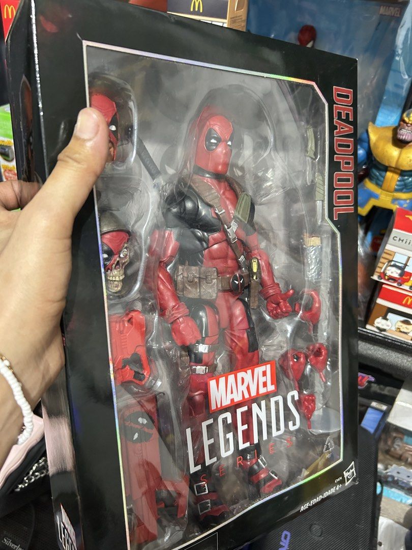 12 inches Marvel Legends Deadpool Action Figure with Accessories (Category: Figurines & Statues) located in Muntinlupa City. Submitted by capitalrg (Listing ID 1463567139, Image 3). Description: - Brand new Marvel Legends Deadpool action figure - Still sealed in original packaging - Includes multiple heads, hands, and weapons - A must-have for any Deadpool fan's collection .