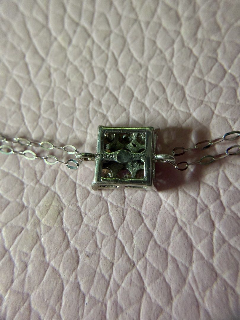 18K White Gold Diamond Necklace (Category: Necklaces) located in Bulacan. Submitted by reenamae (Listing ID 1463577949, Image 2). Description: - 18k white gold .25 carat real And natural diamonds Lightweight bracelet Genuine 18K white gold bracelet - Features a dazzling square pendant adorned with multiple small diamonds. - Delicate chain measures approximately 16 inches in length. - Equipped with a secure clasp for peace of mind. - Adds a touch 