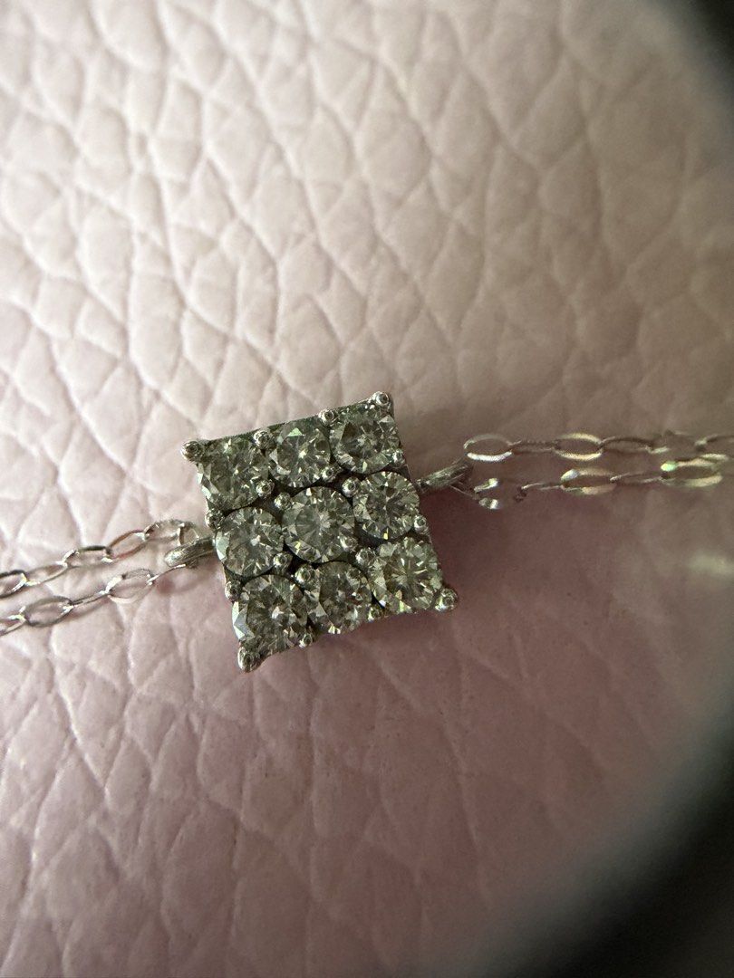 18K White Gold Diamond Necklace (Category: Necklaces) located in Bulacan. Submitted by reenamae (Listing ID 1463577949, Image 1). Description: - 18k white gold .25 carat real And natural diamonds Lightweight bracelet Genuine 18K white gold bracelet - Features a dazzling square pendant adorned with multiple small diamonds. - Delicate chain measures approximately 16 inches in length. - Equipped with a secure clasp for peace of mind. - Adds a touch 