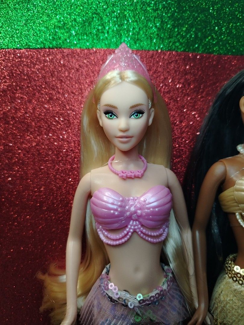 2 Debbie Mermaid Dolls (Category: Kids Toys) located in Davao. Submitted by lavsjay (Listing ID 1463606107, Image 3). Description: - Two Debbie mermaid dolls -Php 600 each - Blonde mermaid: pink outfit, sparkly tail, accessories - Dark-haired mermaid: gold outfit, sparkly tail, accessories - Perfect for collectors or playtime - Ready to find a new home! Payment through Gcash or Maribank Shipping via J&T .