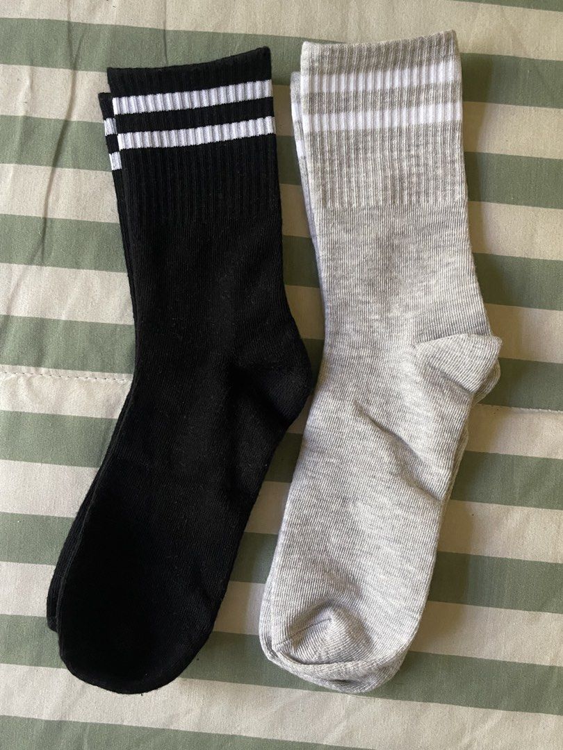 2 Pairs Striped Crew Socks - Black & Grey (Category: Undergarments & Loungewear) located in Santa Cruz. Submitted by lilpurpleseven (Listing ID 1463559999, Image 1). Description: - Available in black and grey. - Classic three white stripes at the top. - Ideal for everyday wear and sports. - Made with comfortable and stretchy material. - A versatile addition to your sock collection..