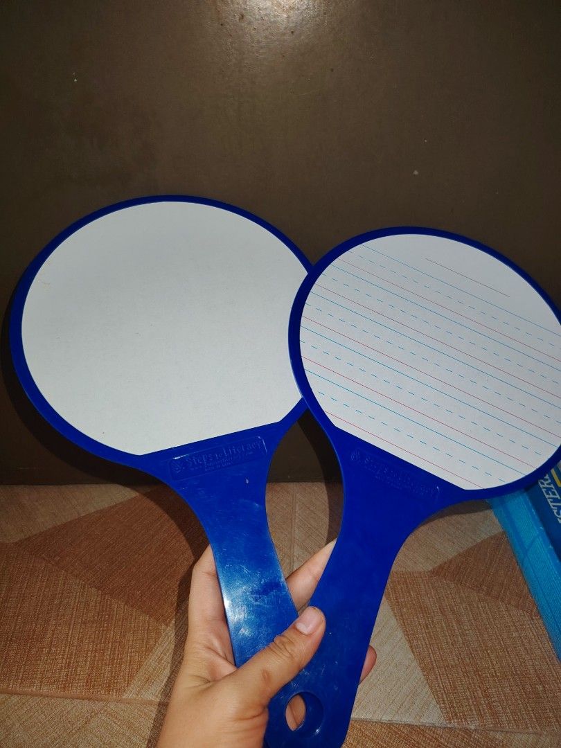 2x Dry Erase Paddle Boards with Markers (Category: Stationery & School Supplies) located in Santiago. Submitted by aceheart0118672 (Listing ID 1463586067, Image 3). Description: - Set of 2 blue handled dry erase paddle boards - One board is lined, the other is blank - Includes 10 colorful dry erase markers - Ideal for children learning to write - Great for quick notes and brainstorming - Easy to wipe clean - Markers come in a clear plastic case.