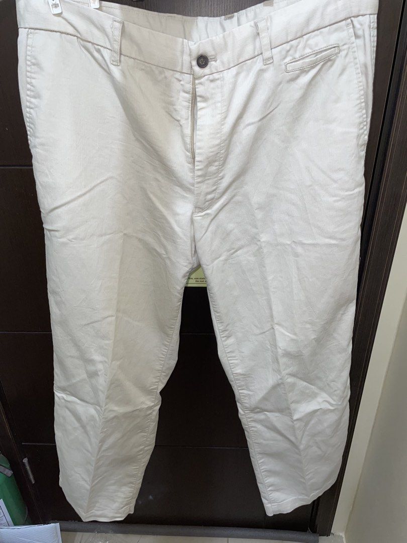 3 pieces of Pants (Off-White) (Category: Chinos) located in Manila. Submitted by oddbear_e25815 (Listing ID 1463688028, Image 3). Description: All fits size 30 waist line set includes: 1 Uniqlo Regular Fit Pants 1 Lee Relaxed Fit Pants 1 (No Brand) Straight Pants (Thrifted).
