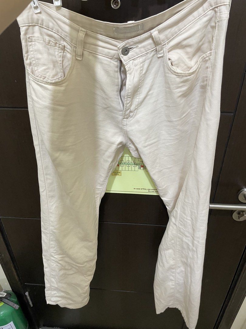 3 pieces of Pants (Off-White) (Category: Chinos) located in Manila. Submitted by oddbear_e25815 (Listing ID 1463688028, Image 1). Description: All fits size 30 waist line set includes: 1 Uniqlo Regular Fit Pants 1 Lee Relaxed Fit Pants 1 (No Brand) Straight Pants (Thrifted).