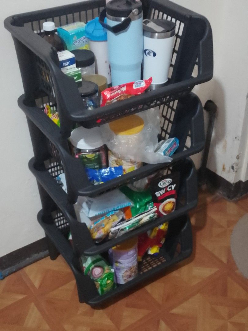 4-Tier Stackable Storage Basket Organizer (Category: Storage Boxes & Baskets) located in Cavite. Submitted by rodrycuteshop (Listing ID 1463707575, Image 1). Description: - 4-tier stackable storage basket organizer - Color: Black - Material: Durable plastic - Versatile: Use individually or stacked - Ideal for organizing groceries, toiletries, kitchen items, and more - Helps keep your space tidy and clutter-free.
