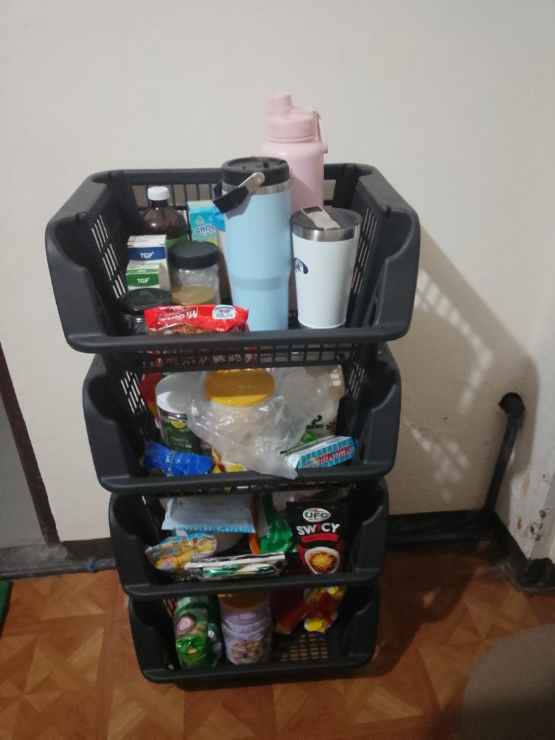 4-Tier Stackable Storage Basket Organizer (Category: Storage Boxes & Baskets) located in Cavite. Submitted by rodrycuteshop (Listing ID 1463707575, Image 2). Description: - 4-tier stackable storage basket organizer - Color: Black - Material: Durable plastic - Versatile: Use individually or stacked - Ideal for organizing groceries, toiletries, kitchen items, and more - Helps keep your space tidy and clutter-free.