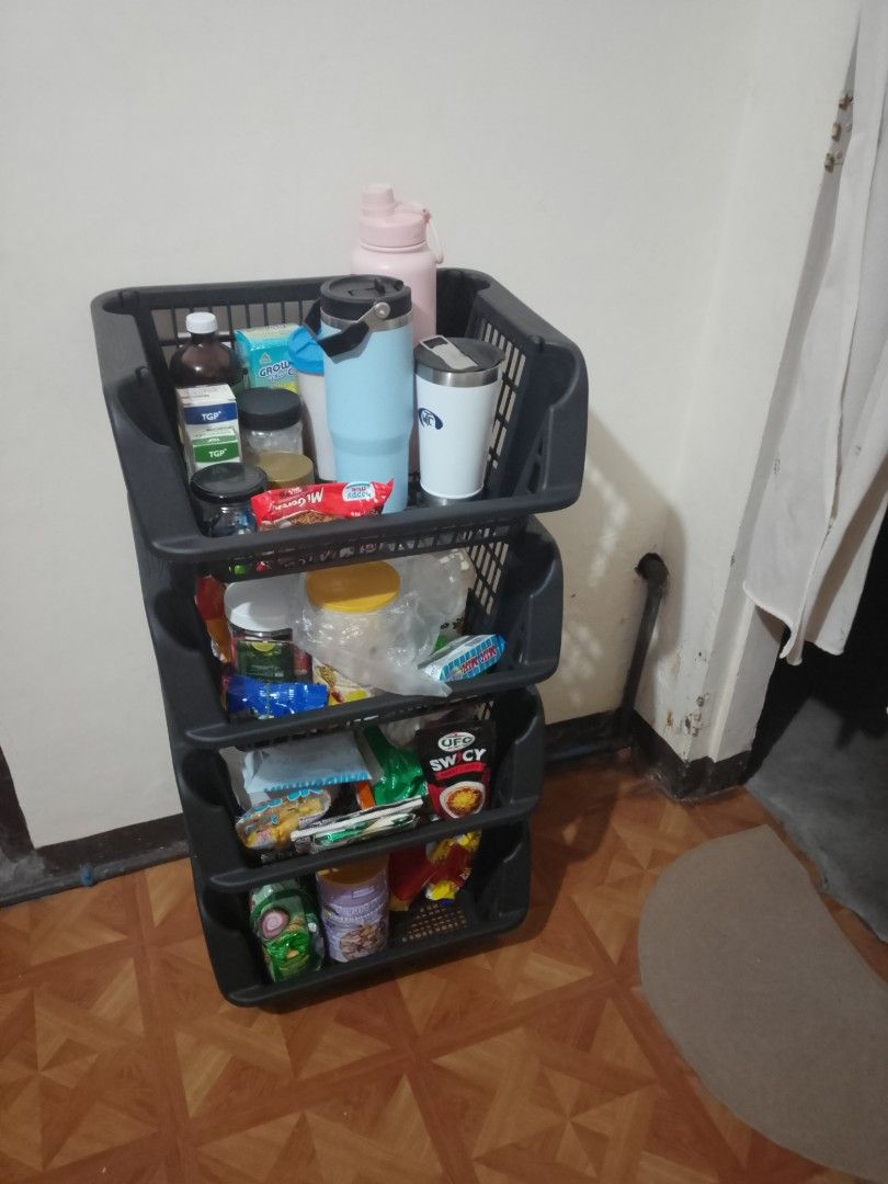 4-Tier Stackable Storage Basket Organizer (Category: Storage Boxes & Baskets) located in Cavite. Submitted by rodrycuteshop (Listing ID 1463707575, Image 3). Description: - 4-tier stackable storage basket organizer - Color: Black - Material: Durable plastic - Versatile: Use individually or stacked - Ideal for organizing groceries, toiletries, kitchen items, and more - Helps keep your space tidy and clutter-free.