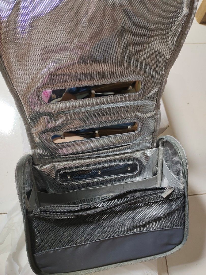 59S UVC LED Sterilizing Bag for Feeding Bottles (Category: Breastfeeding & Bottle Feeding) located in Tayabas. Submitted by lorrena (Listing ID 1463602734, Image 2). Description: - Portable UVC LED sterilizing bag - Perfect for sterilizing feeding bottles on the go - USB powered (cable included) - Easy to carry with handle - Secure zipper closure - Interior with multiple compartments - Comes with original box.