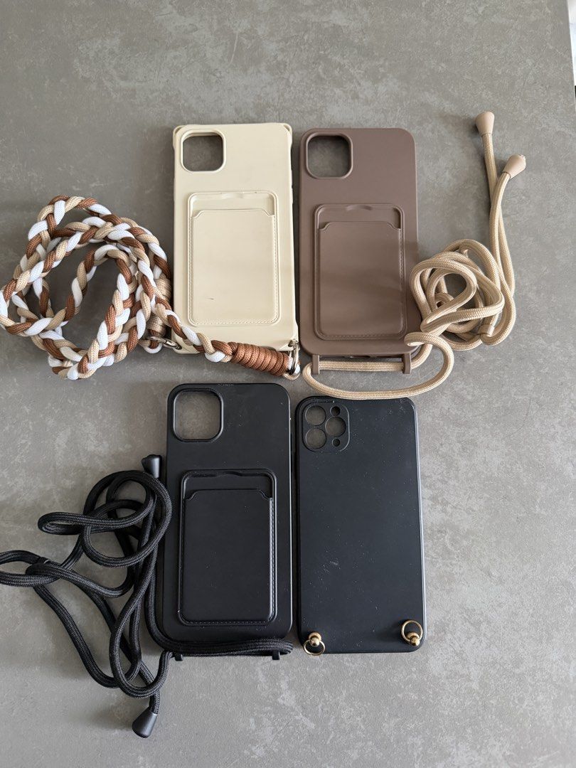 7 iPhone 11 Pro Max Cases Bundle (Category: Cases & Sleeves) located in Taytay. Submitted by thestyletwins (Listing ID 1463600956, Image 1). Description: Selling my collection of 7 preloved iPhone 11 Pro Max cases as a bundle. Includes Louis Vuitton inspired monogram with hand strap, BURGA marble, iDeal of Sweden marble, plus 4 crossbody cases in cream, taupe and black with different straps. Three of the crossbody cases have convenient card pocke