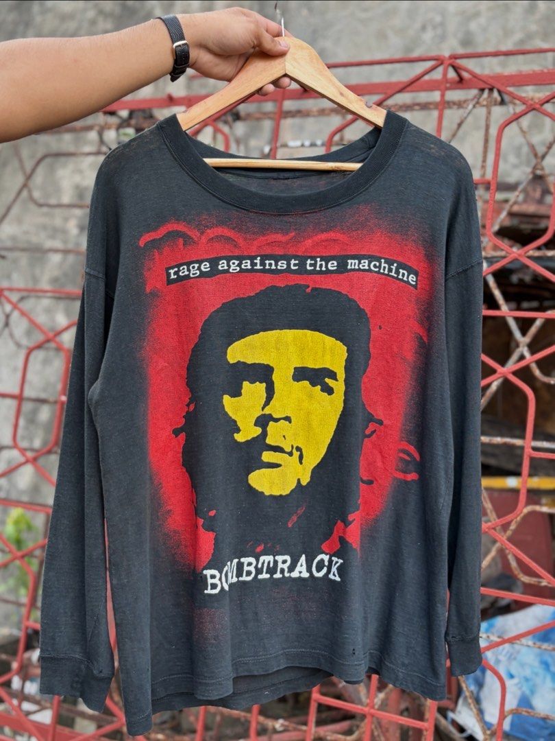 90s Rage Against The Machine Bombtrack boot LS (Category: Tshirts & Polo Shirts ) located in Leyte. Submitted by to.the.other.side (Listing ID 1463597153, Image 1). Description: Rare 90s Rage Against The Machine “Bomb track”💣 euro boot.💥 :Good Large W 22.5 L 27.5 : sunfaded// pinholes// minimal distress// 40,000 php Free ship if claim.