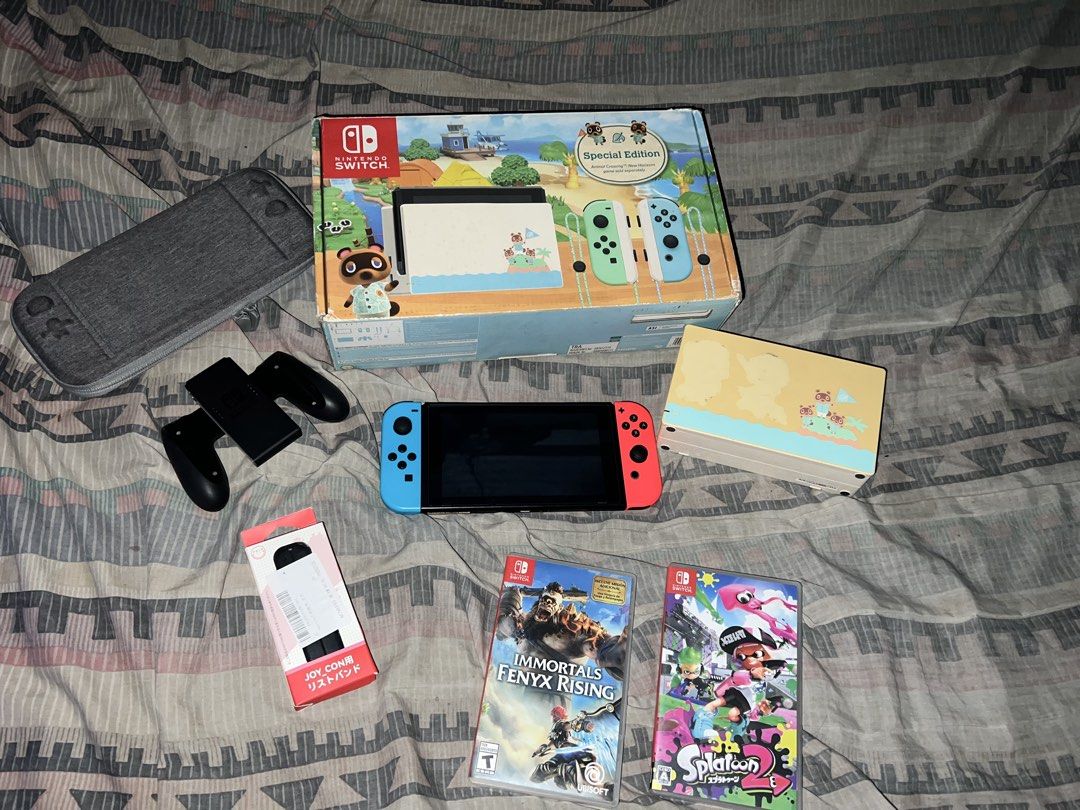 🎮 NINTENDO SWITCH V1 SET (Category: Nintendo) located in Quezon City. Submitted by andreidizon (Listing ID 1463667304, Image 1). Description: 🎮 NINTENDO SWITCH V1 SET — ₱8,300 ONLY! 🔥 Selling my Nintendo Switch V1 complete set with 2 physical games! 📦 INCLUSIONS: 🎮 Nintendo Switch V1 console 🔴🔵 Original Blue & Red Joy-Cons 💾 128GB Original SanDisk microSD Card 🛡️ Tempered glass 🎒 Protective case 🖥️ Nintendo Switch TV Dock 🔌 Original c