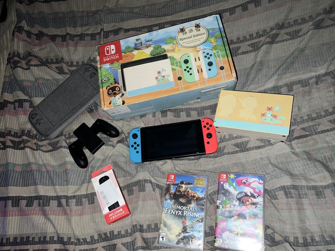 🎮 NINTENDO SWITCH V1 SET (Category: Nintendo) located in Quezon City. Submitted by andreidizon (Listing ID 1463667304, Image 3). Description: 🎮 NINTENDO SWITCH V1 SET — ₱8,300 ONLY! 🔥 Selling my Nintendo Switch V1 complete set with 2 physical games! 📦 INCLUSIONS: 🎮 Nintendo Switch V1 console 🔴🔵 Original Blue & Red Joy-Cons 💾 128GB Original SanDisk microSD Card 🛡️ Tempered glass 🎒 Protective case 🖥️ Nintendo Switch TV Dock 🔌 Original c