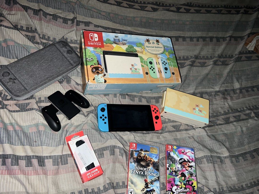 🎮 NINTENDO SWITCH V1 SET (Category: Nintendo) located in Quezon City. Submitted by andreidizon (Listing ID 1463667304, Image 2). Description: 🎮 NINTENDO SWITCH V1 SET — ₱8,300 ONLY! 🔥 Selling my Nintendo Switch V1 complete set with 2 physical games! 📦 INCLUSIONS: 🎮 Nintendo Switch V1 console 🔴🔵 Original Blue & Red Joy-Cons 💾 128GB Original SanDisk microSD Card 🛡️ Tempered glass 🎒 Protective case 🖥️ Nintendo Switch TV Dock 🔌 Original c