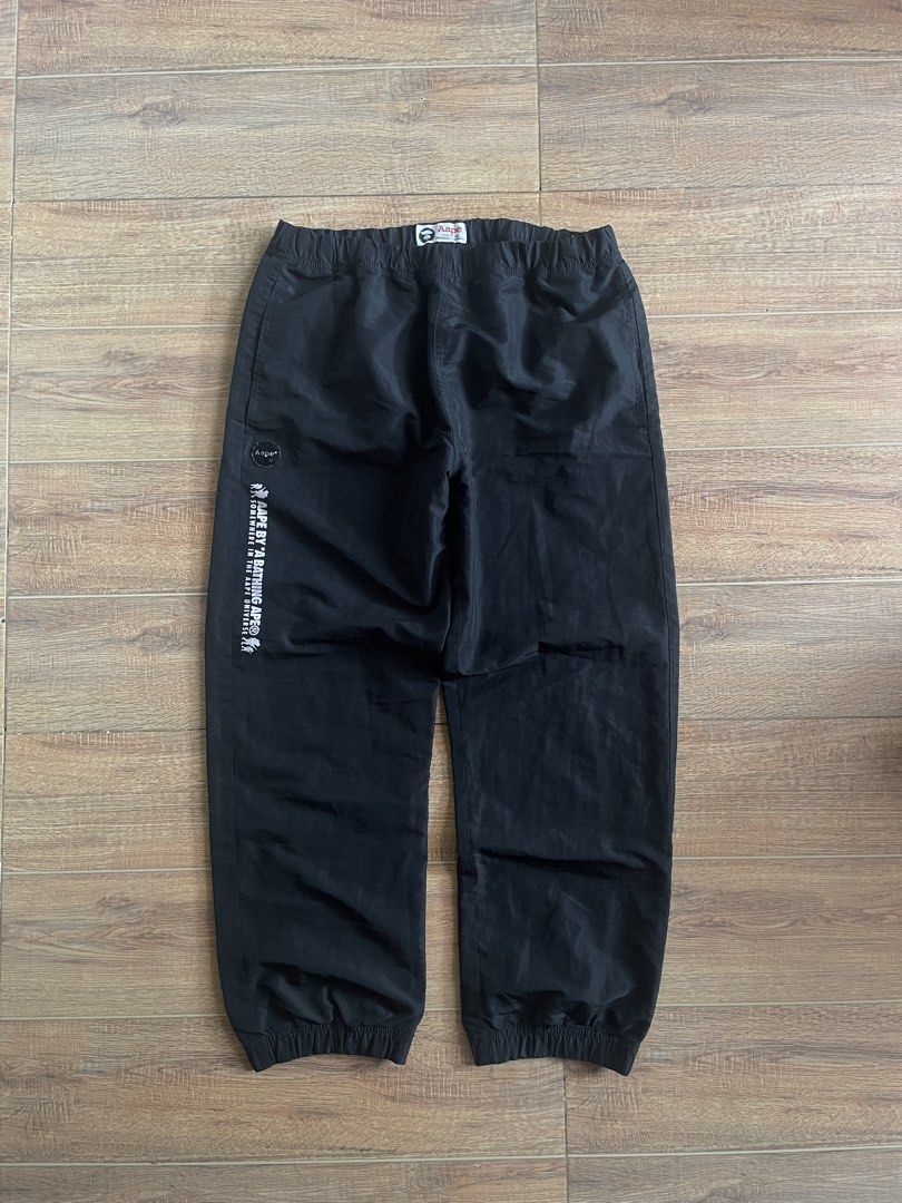 AAPE NYLON TRACK PANTS (Category: Joggers) located in Iloilo. Submitted by cuzta.thrift (Listing ID 1463713987, Image 3). Description: AAPE NYLON PANTS DIMES: W: FREE L:36 HEM:7.5-8(stretchable) CONDITION:10/10 COLOR:10/10 ISSUE:NONE.