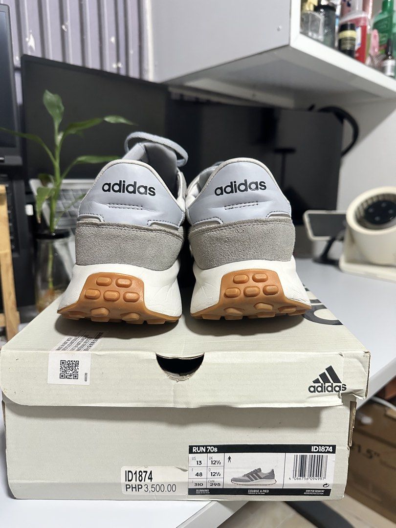 Addida RUN70 running shoes (Category: Casual Shoes) located in Manila. Submitted by businessrs39748 (Listing ID 1463719228, Image 2). Description: 👟 PRE-LOVED ADIDAS RUN 70s 👟 Decluttering and letting go of my Adidas Run 70s! ❤️ 📌 Size: US 13 / UK 12.5 / EU 48 📌 Color: Grey/White 📌 Code: ID1874 📌 Original price: ₱3,500 📌 Condition: Pre-loved, still in good condition 📌 Selling for: ₱1650 Perfect for casual wear, walking, or everyday use. P